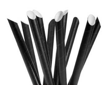Black straws with white tips on a white background