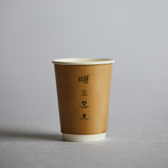 Brown paper cup with a white rim on a gray background