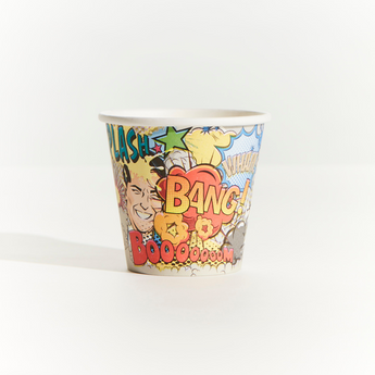 Comic-themed paper cup with superhero graphics and action words on a white background