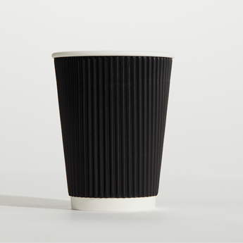 Black paper cup with a ribbed texture on a white background