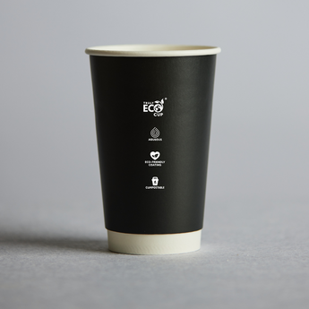 Black eco-friendly cup with white text and symbols on a gray background