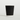 Black paper cup with a white rim on a light gray background