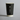 Black eco-friendly cup with white text and symbols on a gray background